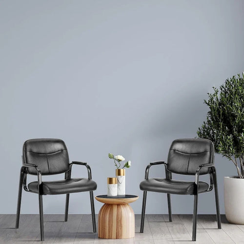 Zwarte receptiestoelen van PU-leer met metalen frame